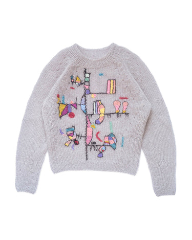 Grey mohair sweater laid flat on white background. The sweater is adorned with colourful abstract embroidered shapes and patterns on the front.